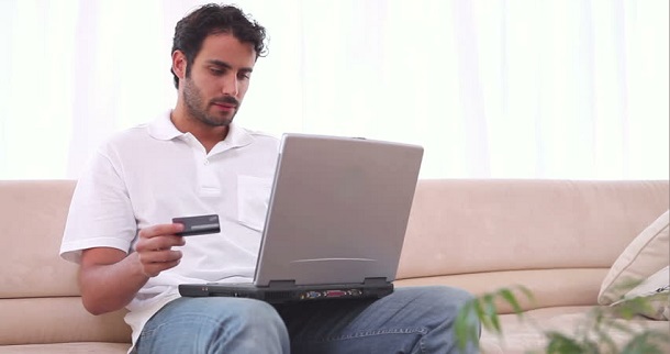 man using credit card online