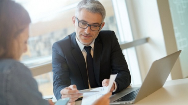 man explaining asset finance to business woman