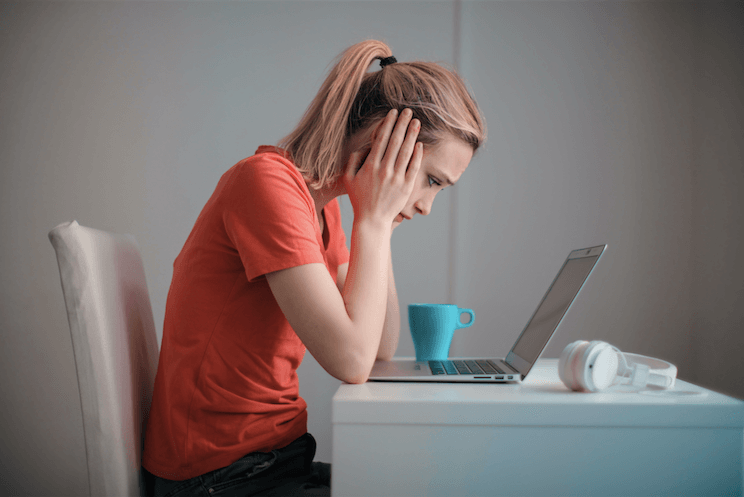 Concerned-woman-looking-at-laptop